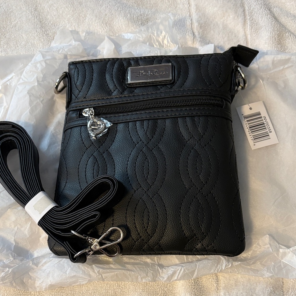 Elegant Black Crossbody Bag by Sakroots